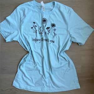 Bella Canvas “helping little minds grow,” teacher tee